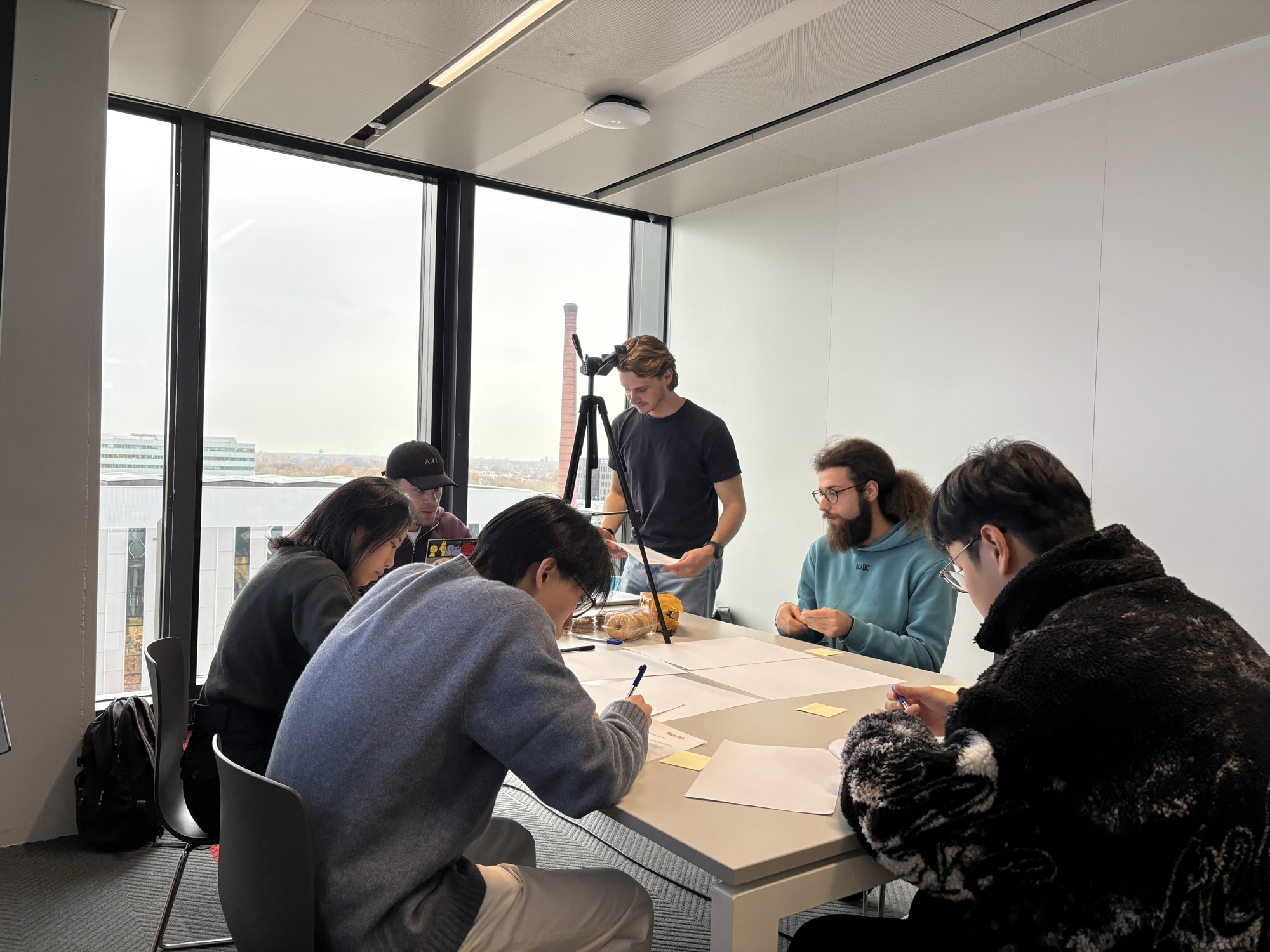 The Wizard-of-Oz session: participants brainstorming while a camera records